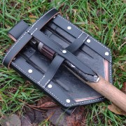 Cover carrier for folding shovel